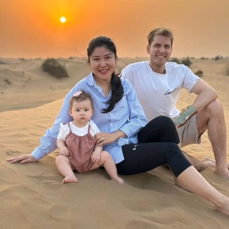 Family photo on the dunes at sunset